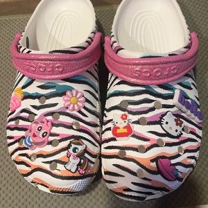 Pink and Zebra Print crocs size J6 Clogs with Cartoon Charms!